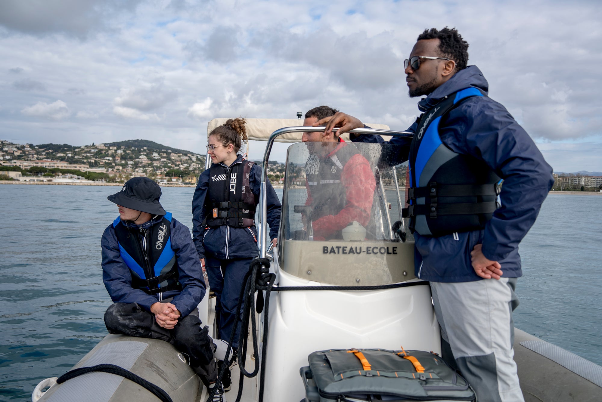 students on a boat learning to navigate